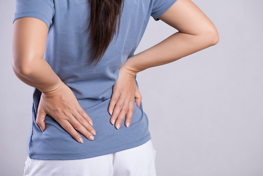 woman having her back pain 